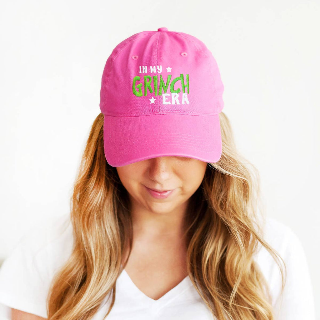 In my Grinch Era Cap: Hot Pink