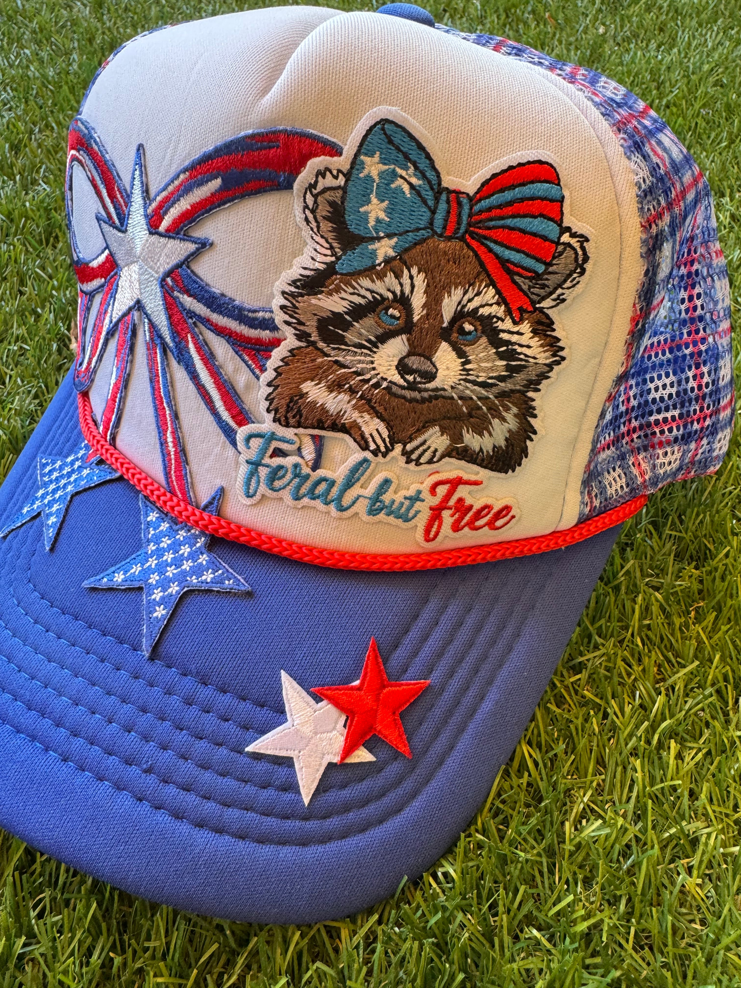 Feral but Free with large USA theme bow trucker hat