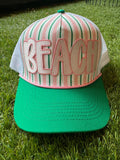 BEACH embroidered patch on green and pink strip hat