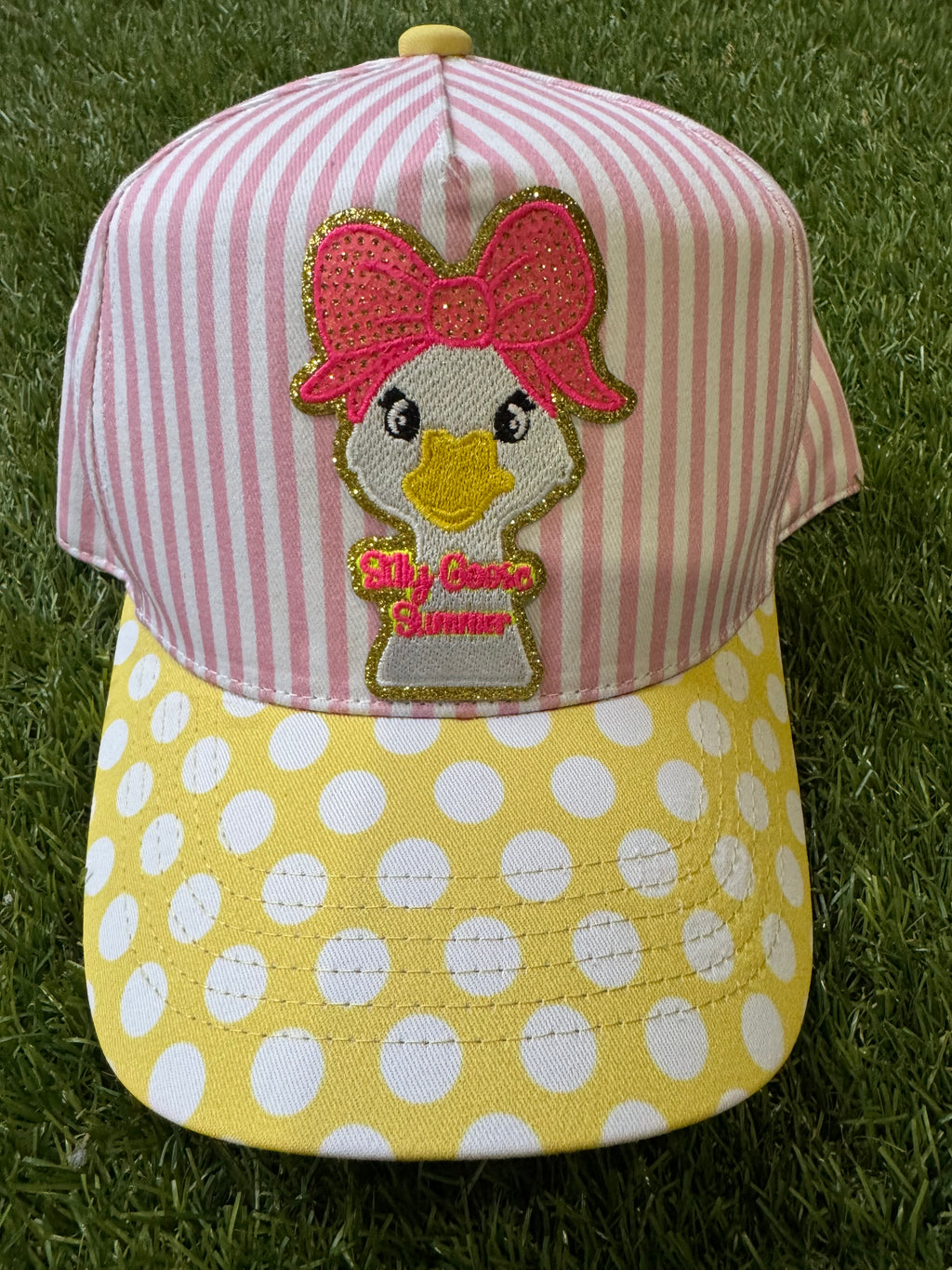 Silly Goose Summer on pink and white strip canvas hat with yellow and white polka dot brim
