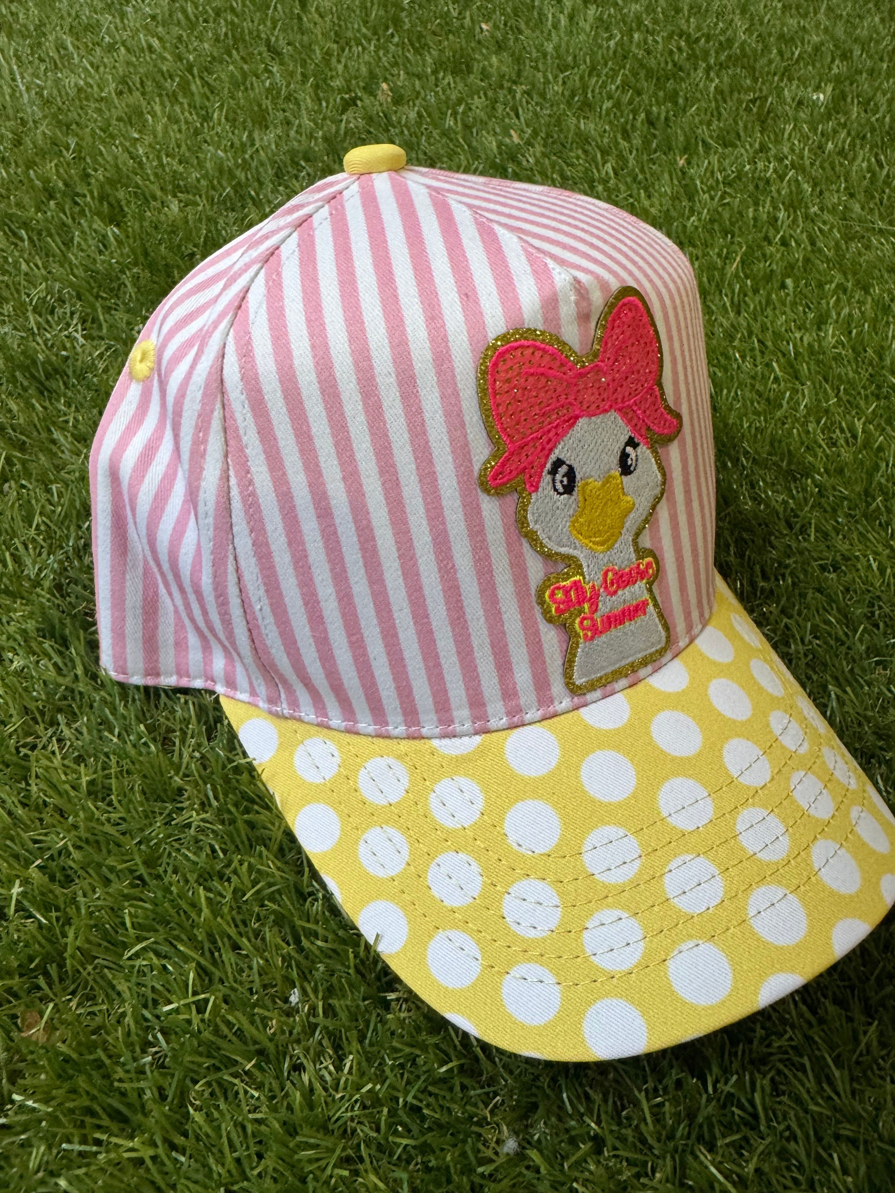 Silly Goose Summer on pink and white strip canvas hat with yellow and white polka dot brim