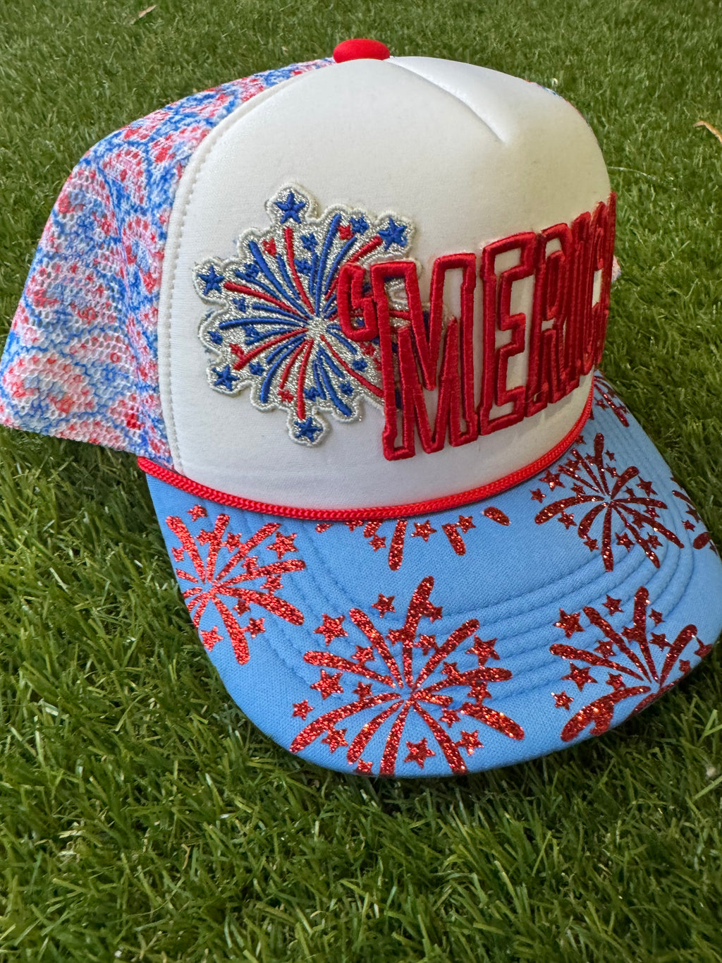 'Merica embroidered patch with fireworks on red, white and blue trucker hat