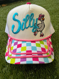 Silly Goose on skates on multicolored checkered brim canvas trucker hat