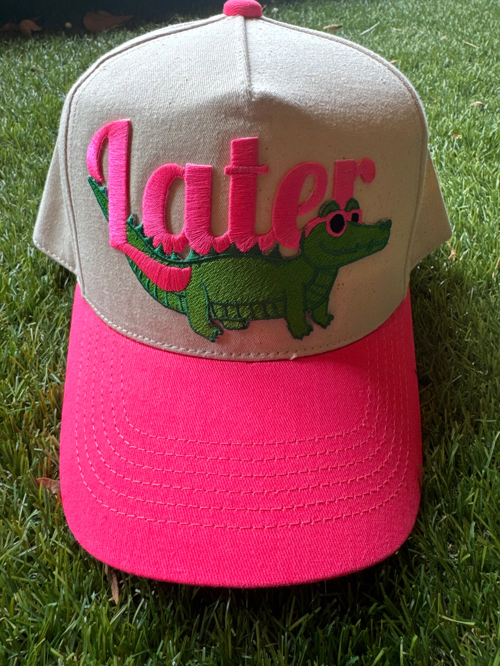 Later Gator on neon pink canvas trucker hat