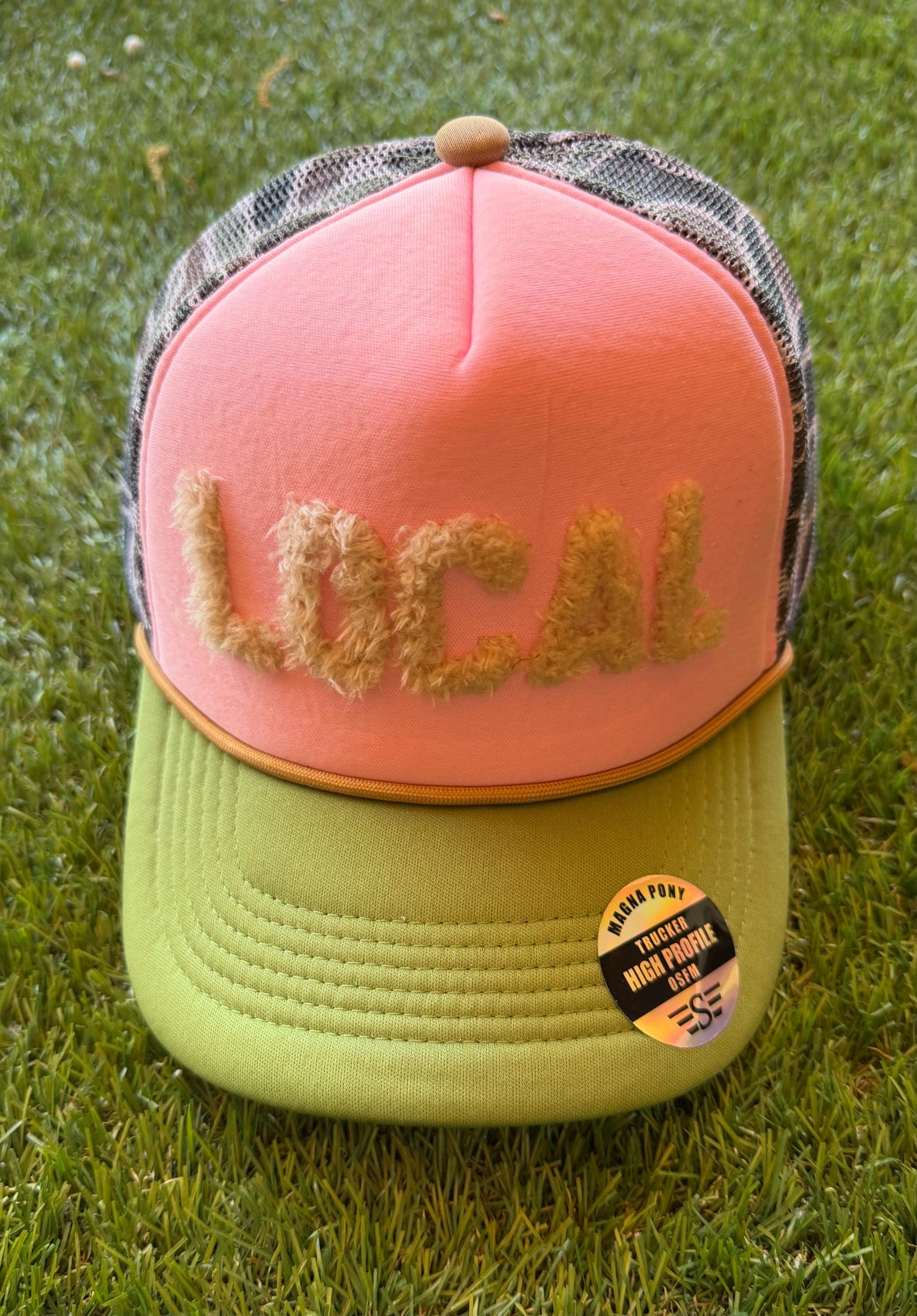 Camouflage trucker hat with fuzzy Local patch