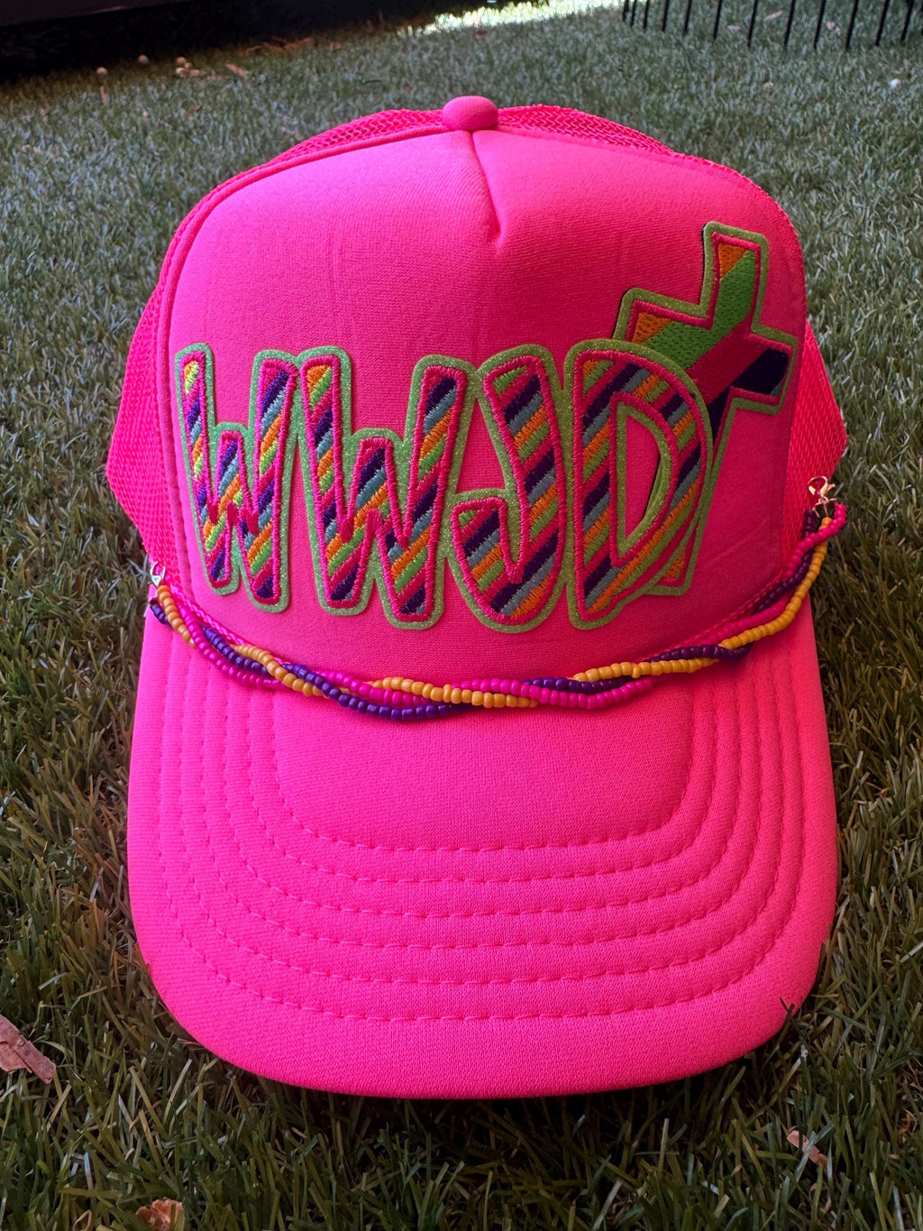 WWJD neon trucker hat