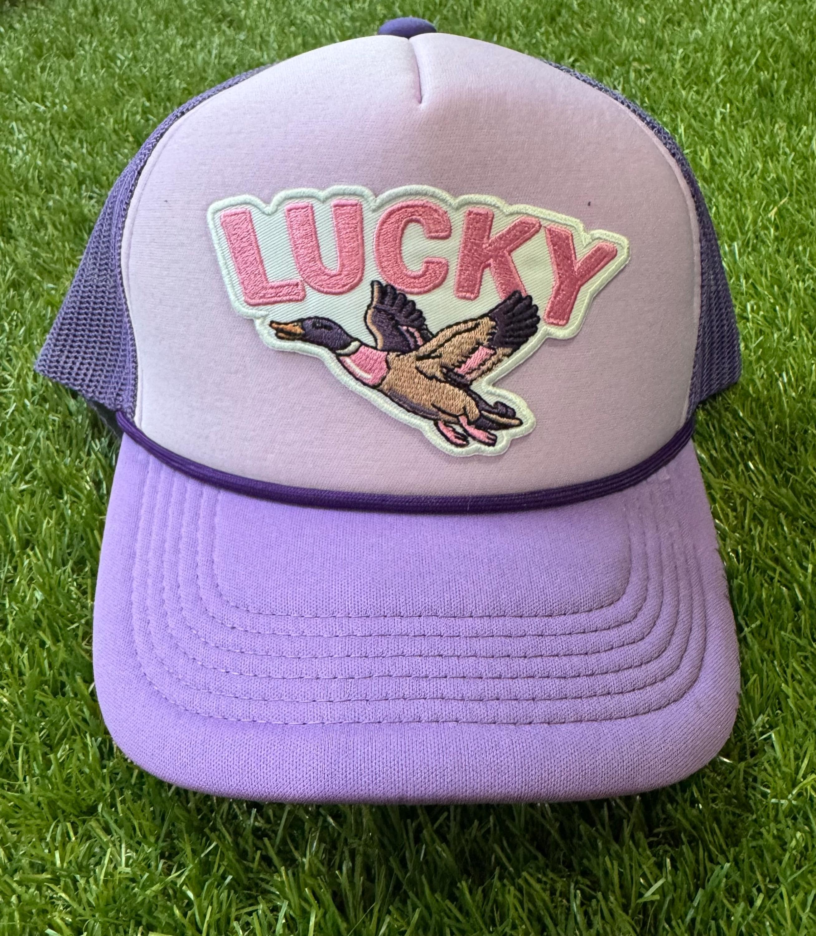 Lucky Duck on purple tri color trucker hat with magna pony