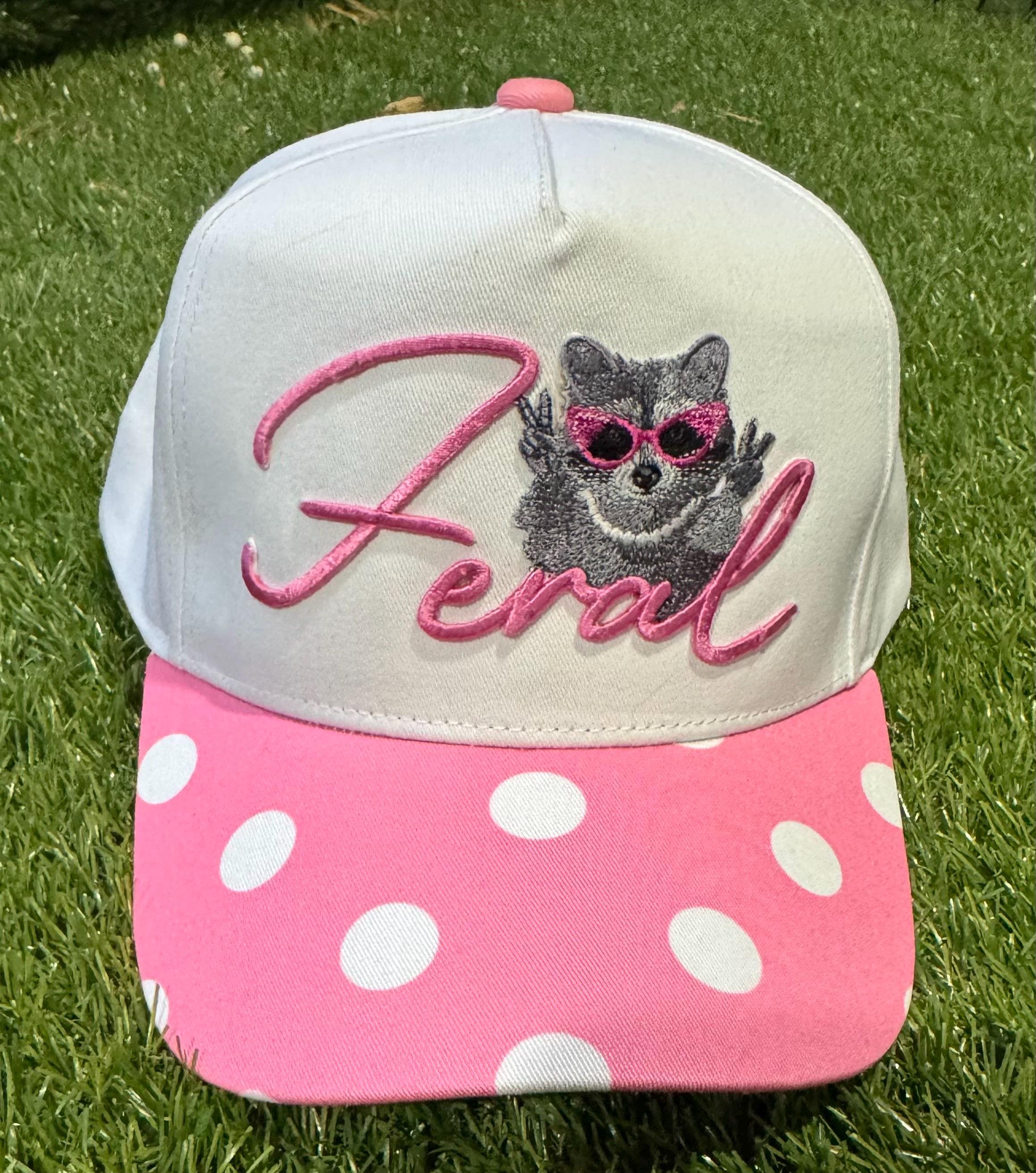 Feral raccoon on pink polka dot canvas trucker hat
