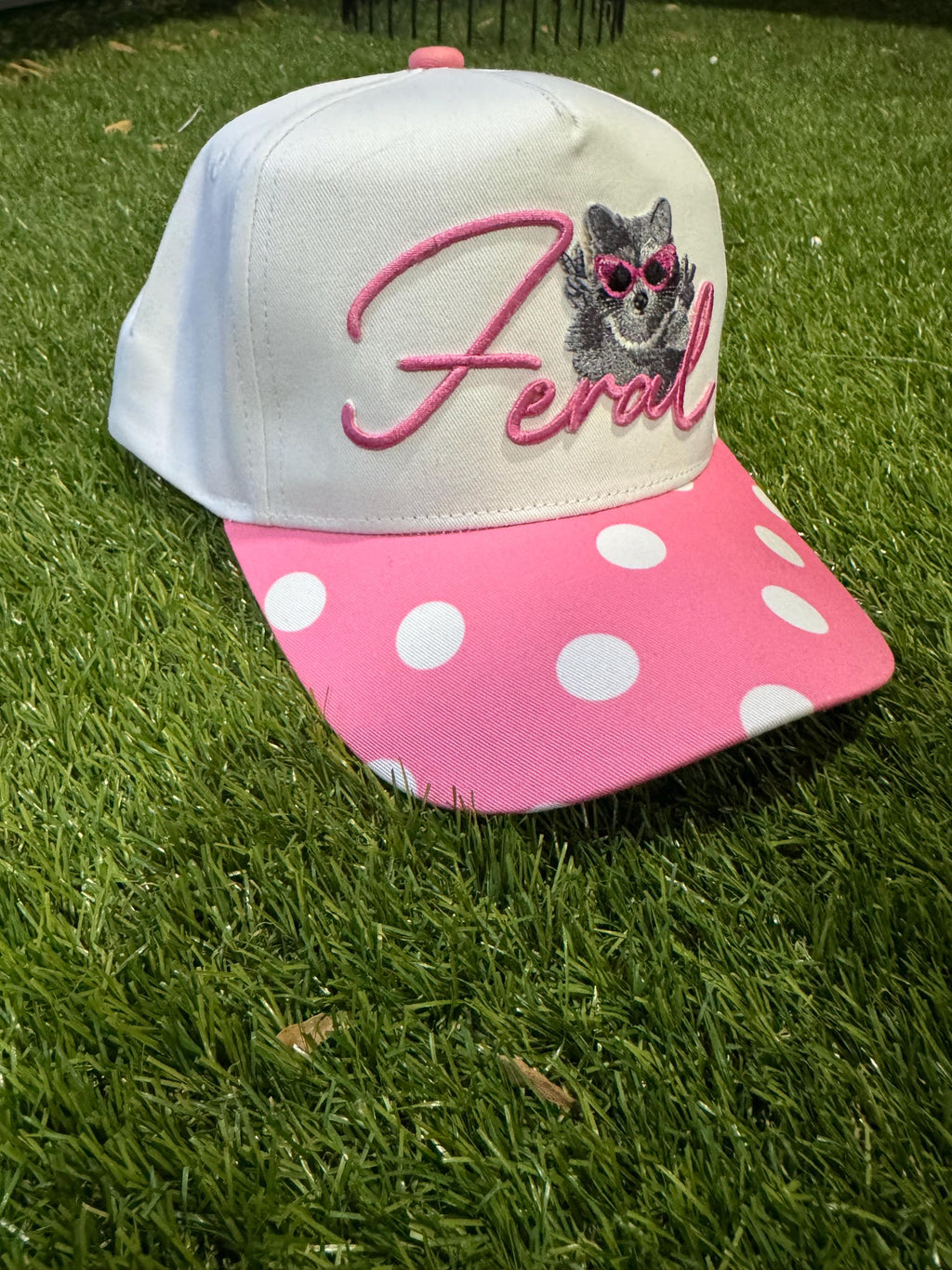 Feral raccoon on pink polka dot canvas trucker hat
