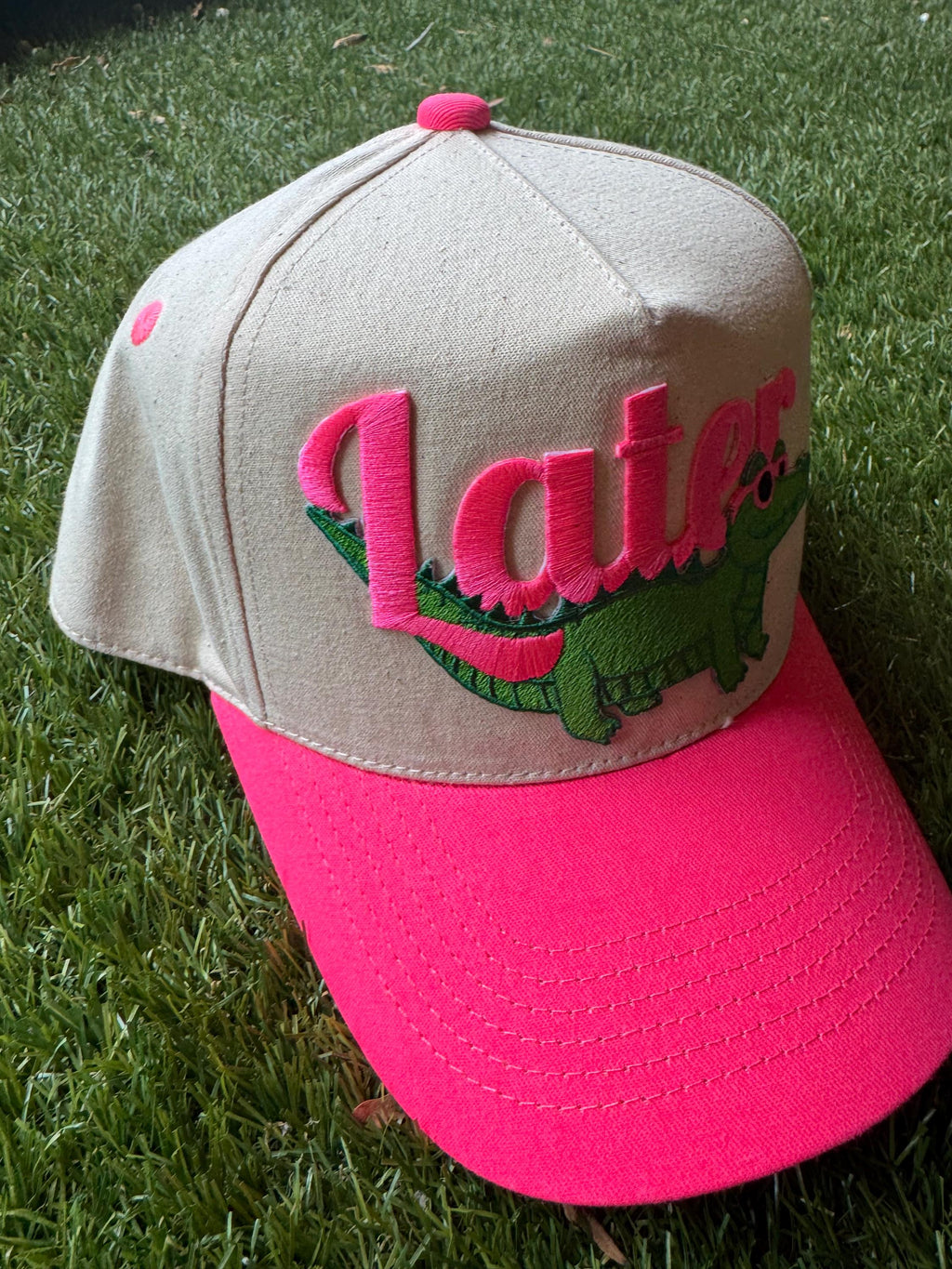 Later Gator on canvas trucker hat with neon pink brim