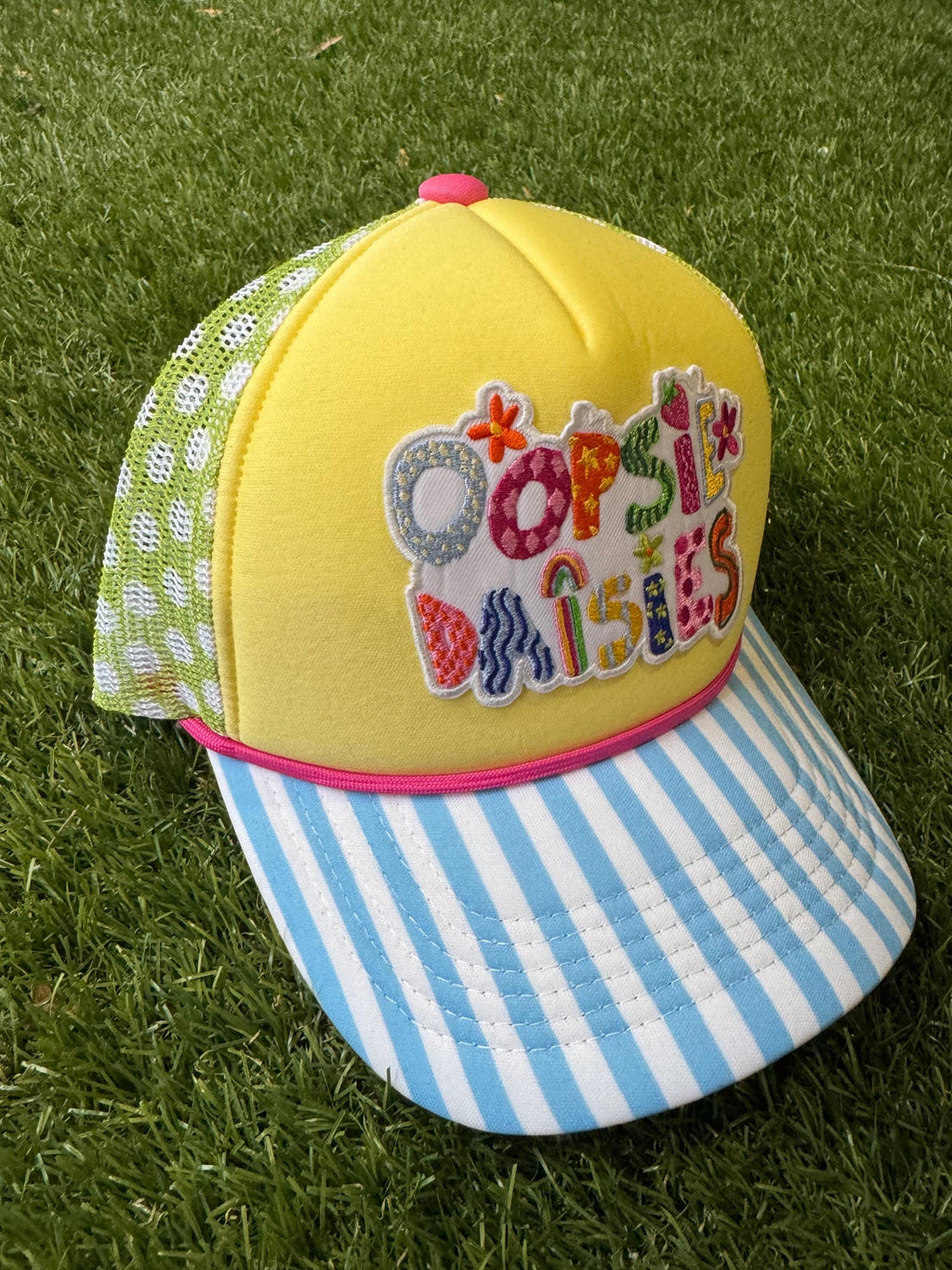 Oopsie Dasies on custom trucker hat with magna pony