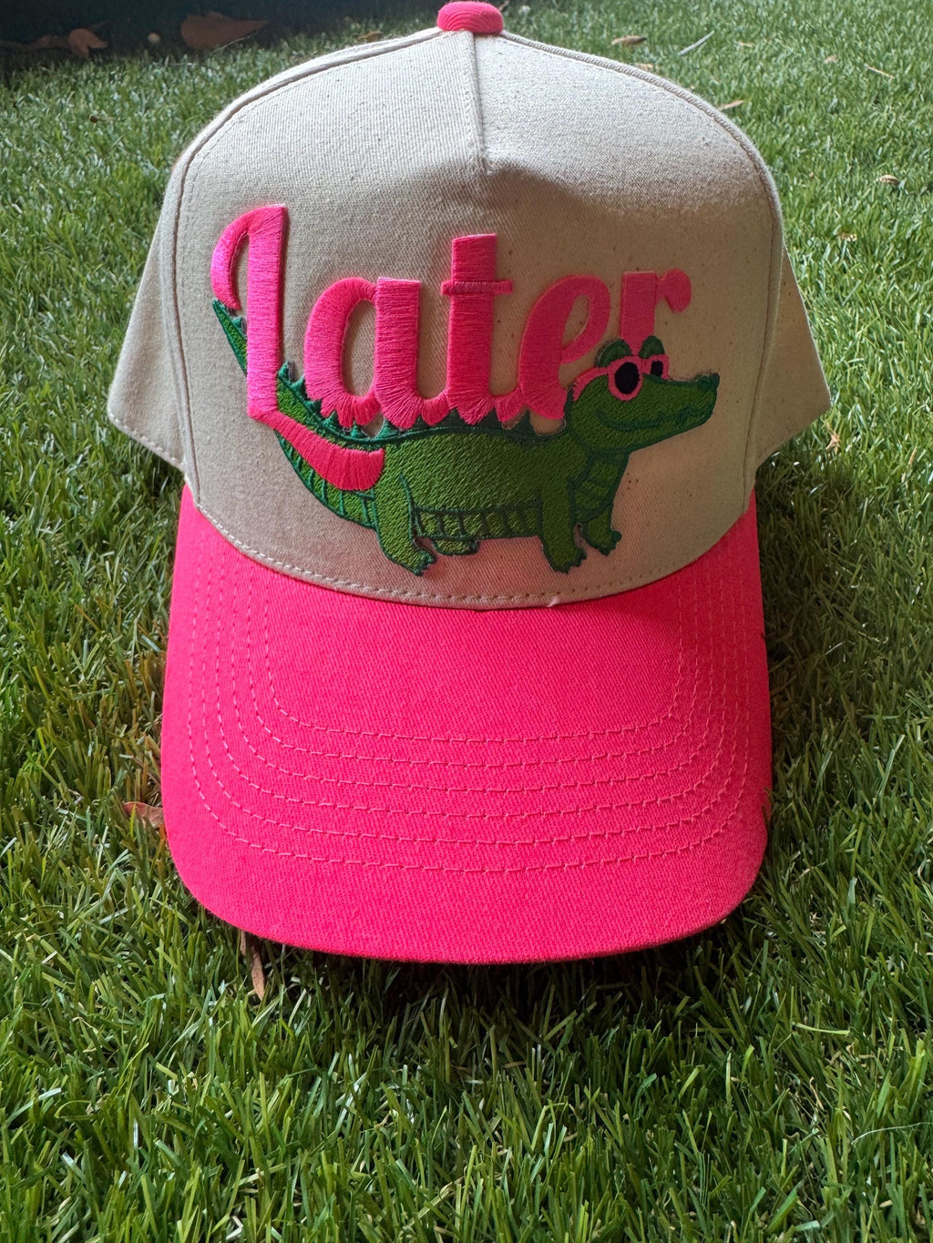Later Gator on canvas trucker hat with neon pink brim