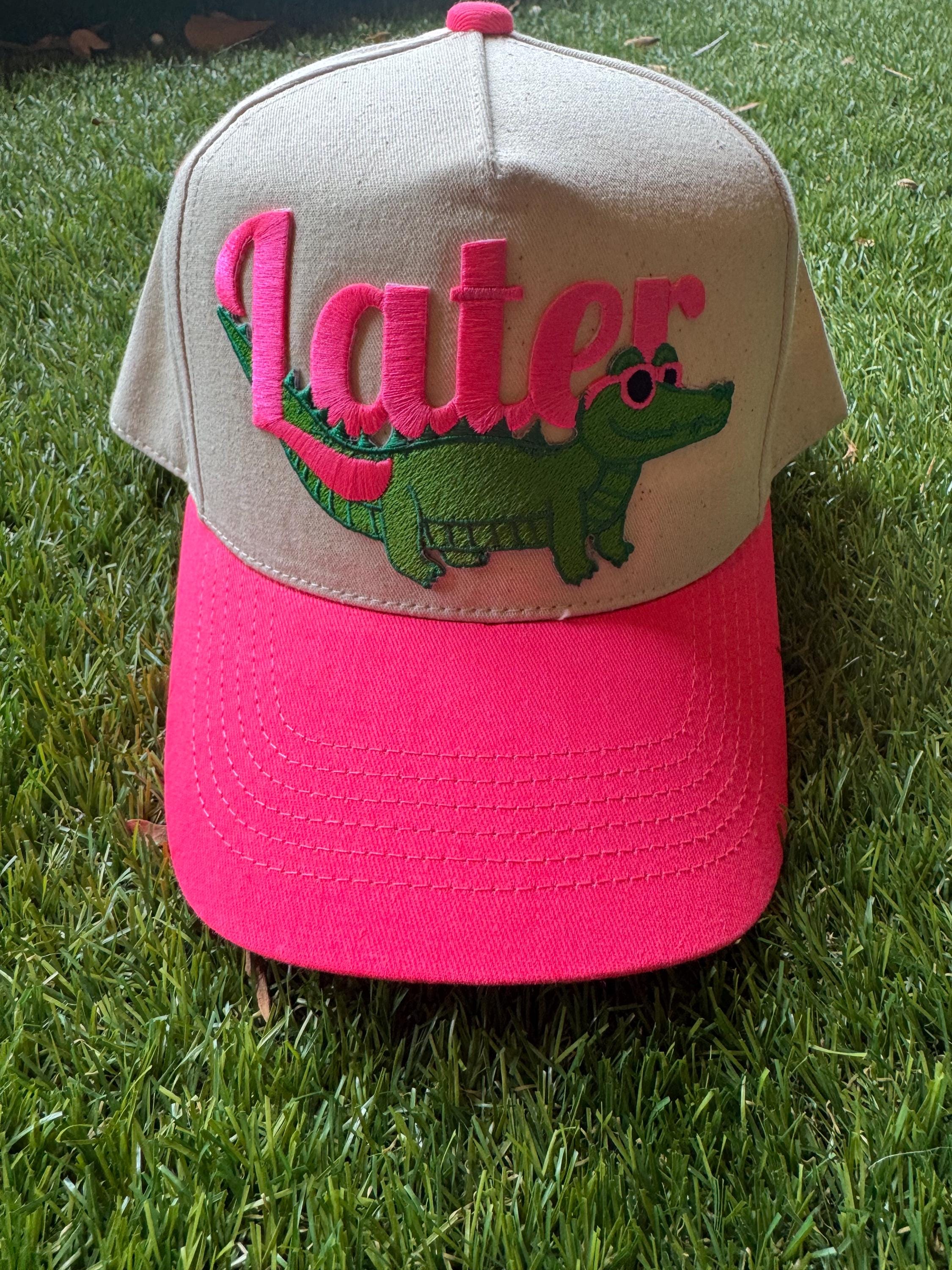 Later Gator on canvas trucker hat with neon pink brim