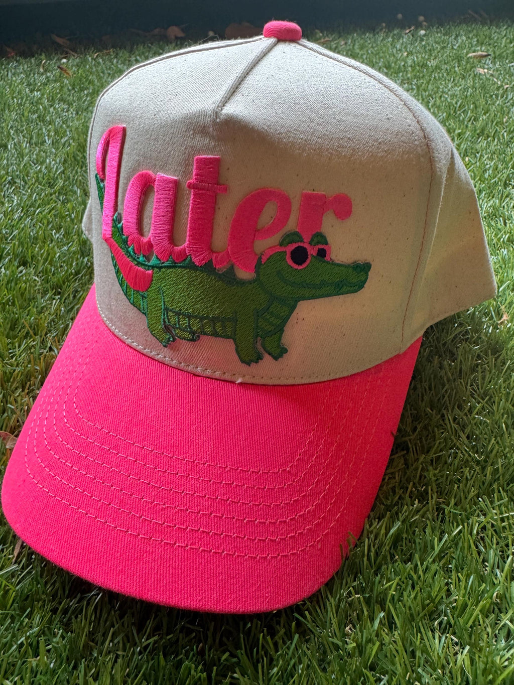 Later Gator on canvas trucker hat with neon pink brim